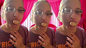 Immerse Yourself in ASMR Bubblegum Bursts Through Headphones with Glasses On