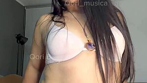 peruvian latina dances her qori puchaina seductively on camera