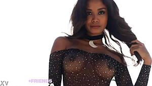Slutty Putri Cinta bares her big tits and ass on tropical sands