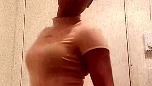 damn this horny ebony whore flashes chocolate ass cheeks in bathroom mirror