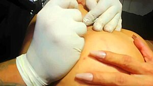 whoa tattooing that whore's tight ass hole while the artist inks her gaping anus 😈🔥