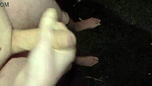mysterious guy strokes monster cock naked outdoors at night public