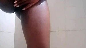Brunette amateur showers in bathroom preparing for her date
