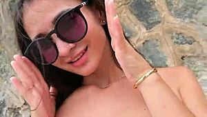 damn bikini babe flashes her sexy curves right on the crowded beach!