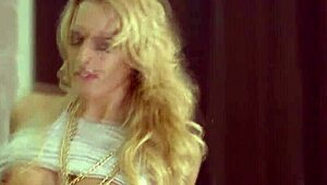 classy blonde grinds big tits down riding her lover's hard cock