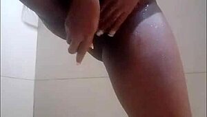 Brunette amateur showers in bathroom preparing for her date