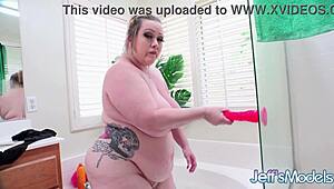 curvy bunny de la cruz rams dildo deep in her huge tits bounce