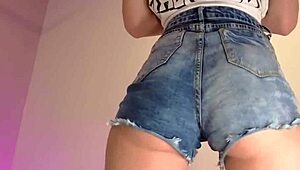 Ever notice how her tiny denim shorts barely cover that big ass? Tease strip incoming