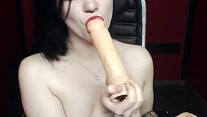 i'm a gothic teen deepthroating dildo on cam while smoking cigs