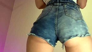 Ever notice how her tiny denim shorts barely cover that big ass? Tease strip incoming