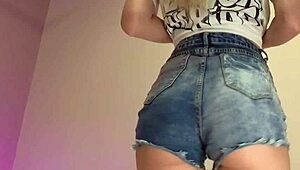 Ever notice how her tiny denim shorts barely cover that big ass? Tease strip incoming