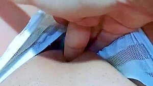 pretty girl fingers her wet shaved pussy hard in office bathroom