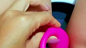 pretty girl fingers her wet shaved pussy hard in office bathroom