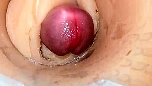 Camera deep inside tight pussy captures huge cum explosion