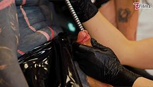 Cruel latex goddesses brutally sound tattoo slave's urethra deep
