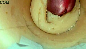 Camera deep inside tight pussy captures huge cum explosion