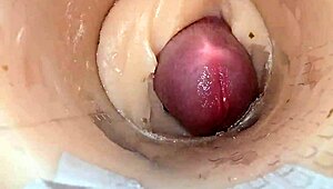 Camera deep inside tight pussy captures huge cum explosion