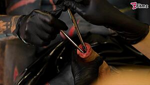 Cruel latex goddesses brutally sound tattoo slave's urethra deep