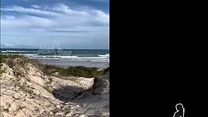 Redhead wife bends over on beach