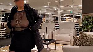 My Wife Browsing Outfits While Shopping In Busy Store