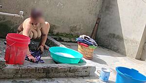 Sexy bhabhi is bathing in outdoor
