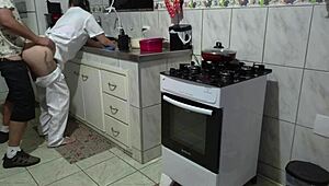 Maid gets her ass used while washing dishes.