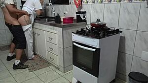 Maid gets her ass used while washing dishes.