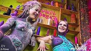 Two tattoo lesbians anal play with big toys