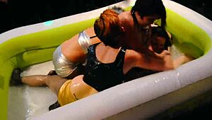 sexy lesbians oil up and wrestle