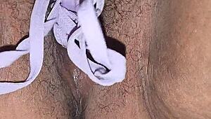 mixed wifey spreads her wet pussy and shoves panties inside
