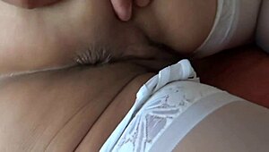 Stepmother moans watching big cocks on tv