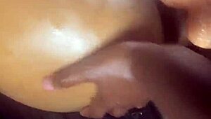 Lesbian rides big strap on toy with passion