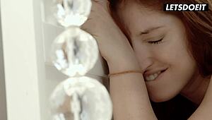 Redhead women share a close intimate moment together