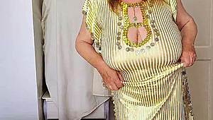Granny teases with huge tits and pussy