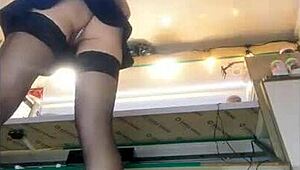 Despite winter this sexy woman is working in miniskirt and showing her ass