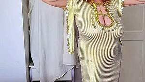 Granny teases with huge tits and pussy