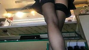 Despite winter this sexy woman is working in miniskirt and showing her ass