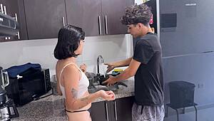 Teen enjoys quiet house time with stepsister in kitchen