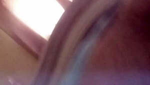 Mature shakes ass with toy in anal play