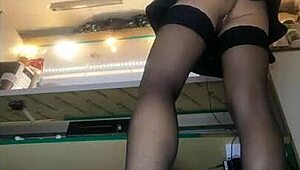 Despite winter this sexy woman is working in miniskirt and showing her ass